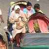 Rickshaw-Fahrgäste 2